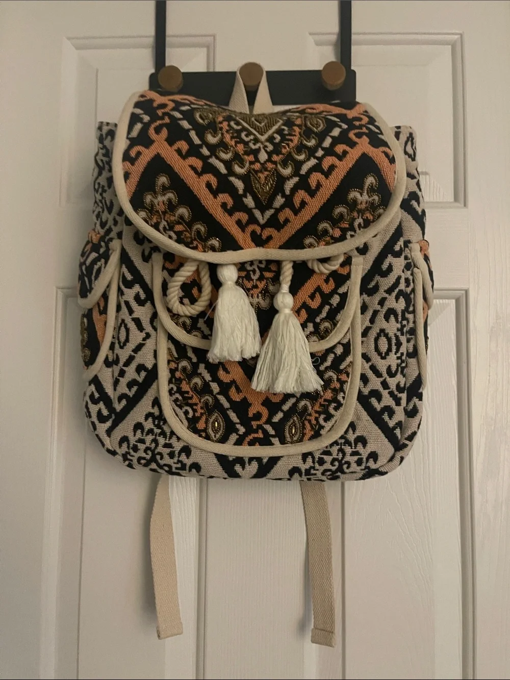 Boho Tassel Drawstring Backpack in Black, Peach & Cream